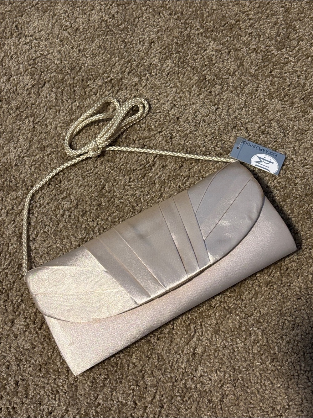 NWT Jessica McClintock Champagne Satin Pleated Clutch, has light marks